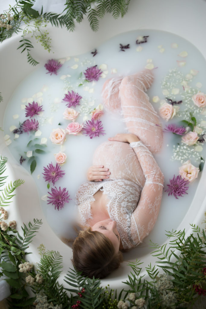 Maternity Milk Bath with pink and purple flowers