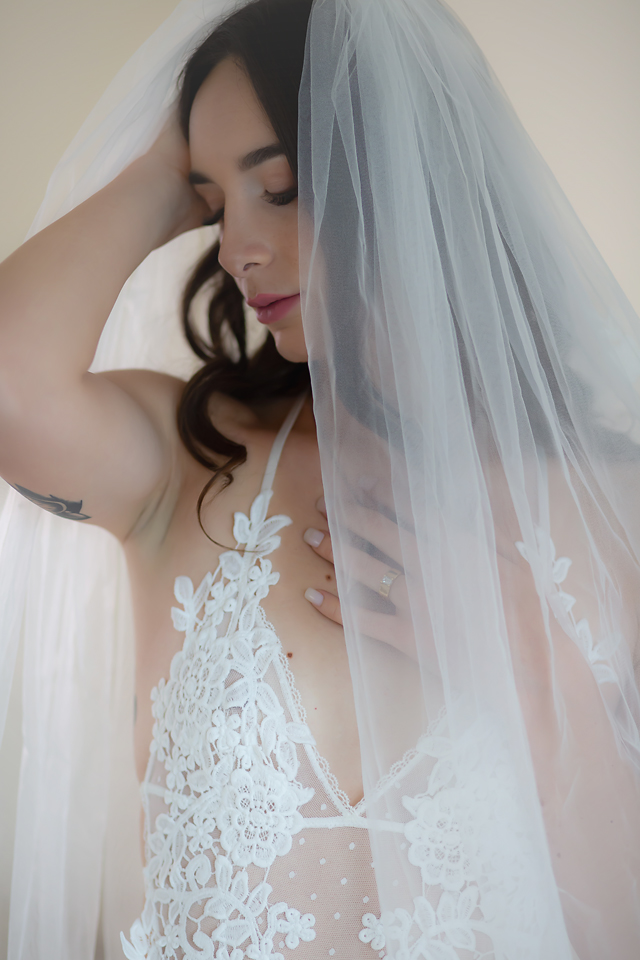 Boudoir Bride from Temecula in white lingerie and veil.  Photo by Kellie Foster Photography and Spark Boudoir